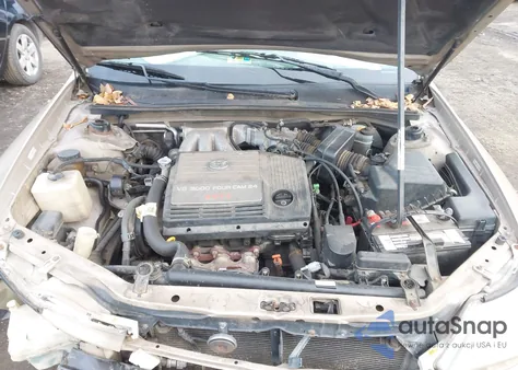 2000 Toyota Avalon Xls z USA, uszkodzony, nr VIN 4T1BF28B0YU112595